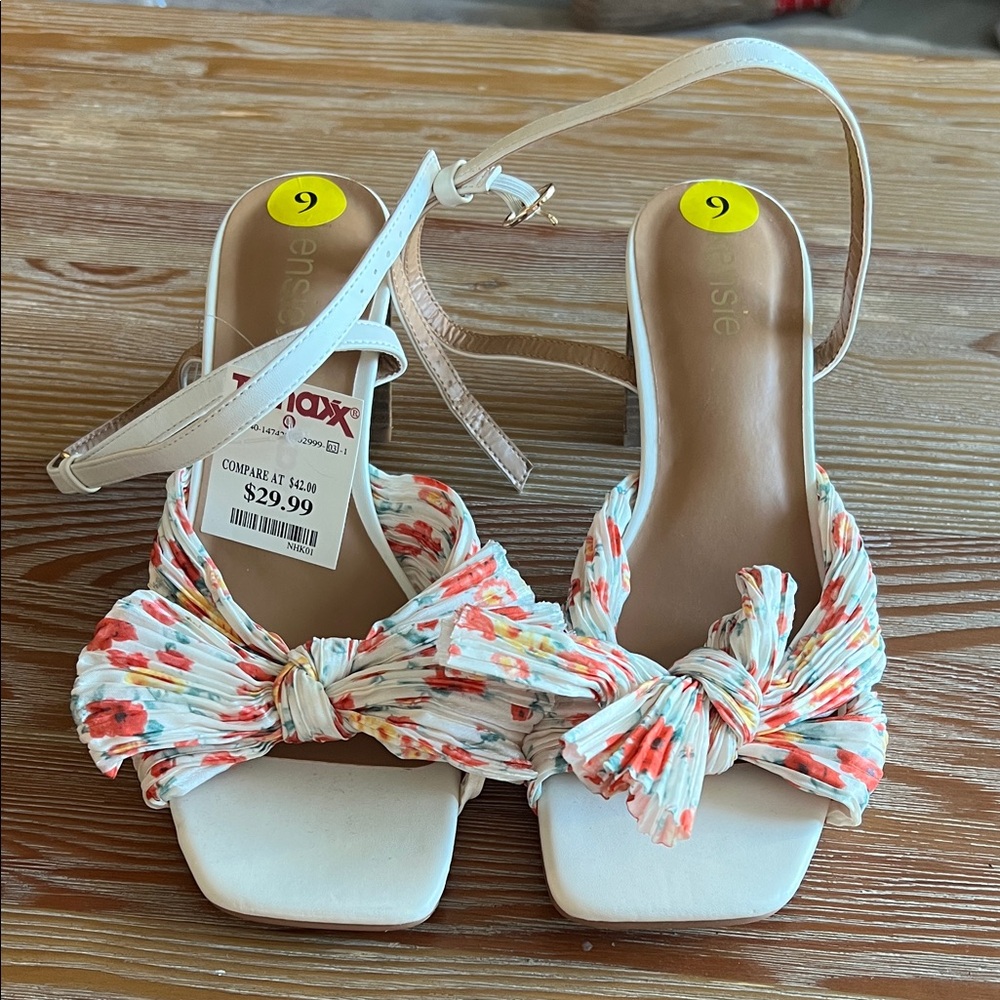 White strappy bow shoes